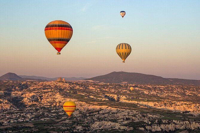 Cappadocia Hot Air Balloon Tour Over Fairychimneys - Pre-Flight at the Launch Site: Hot Drinks, Pastry, and the Winter Reality